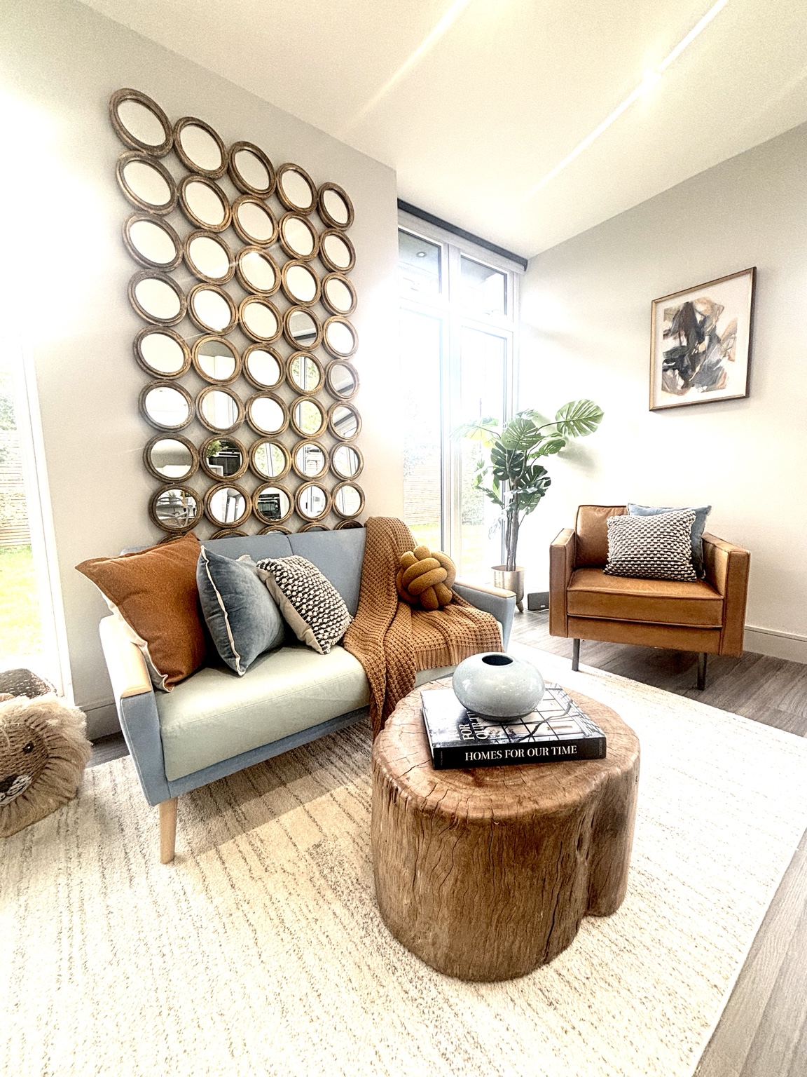 Warmly styled living room for private homeowners by Decoro Design