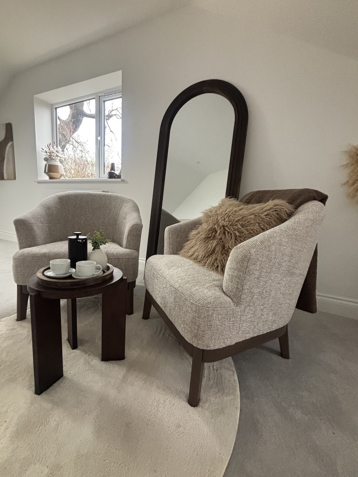 Surrey home staging compact lounge with neutral armchairs