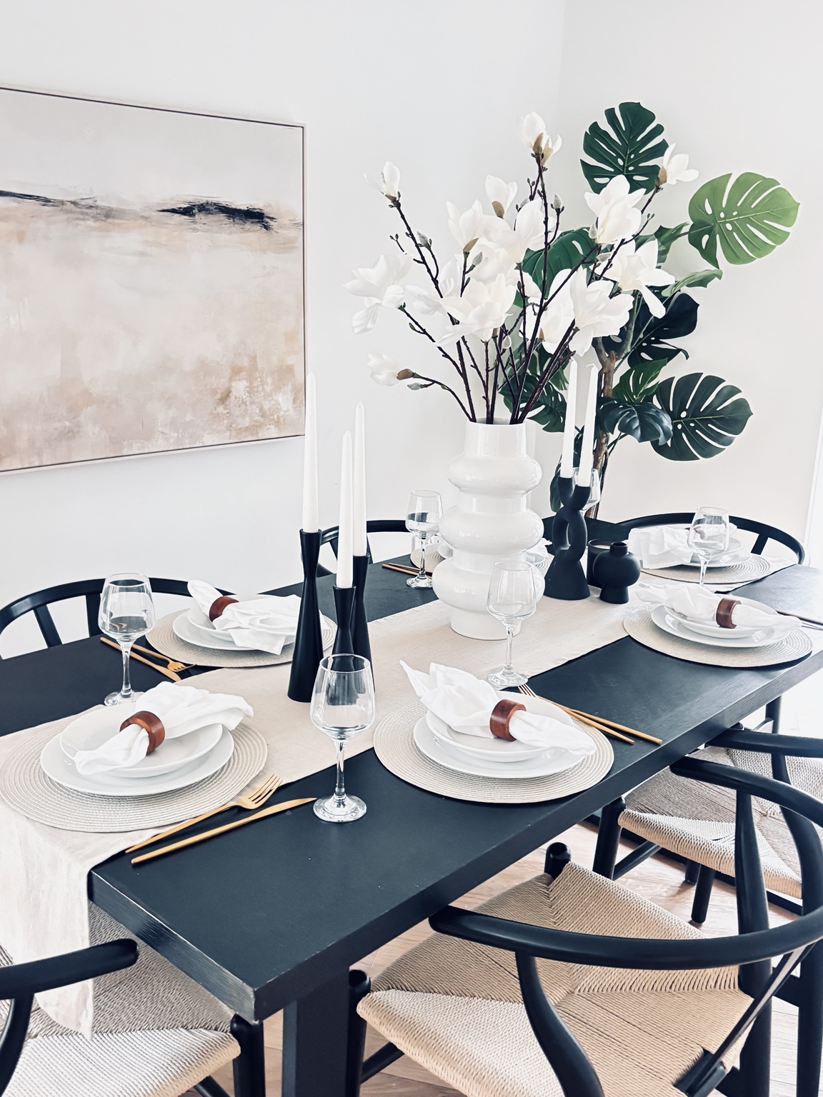 Surrey home staging dining room with dark table and decorative styling